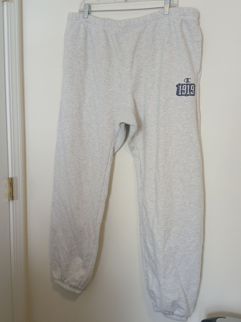 Champion Reverse Weave sweatpants in size XL, featuring 1919 Logo